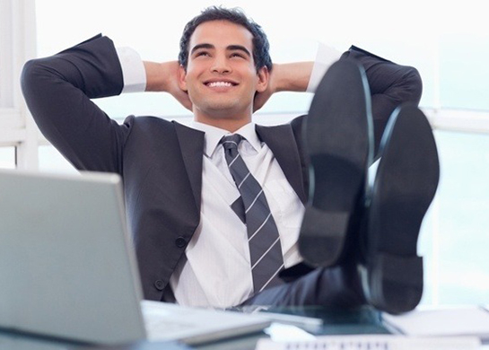 Satisfied businessman relaxing in his office-747491-edited.jpeg image